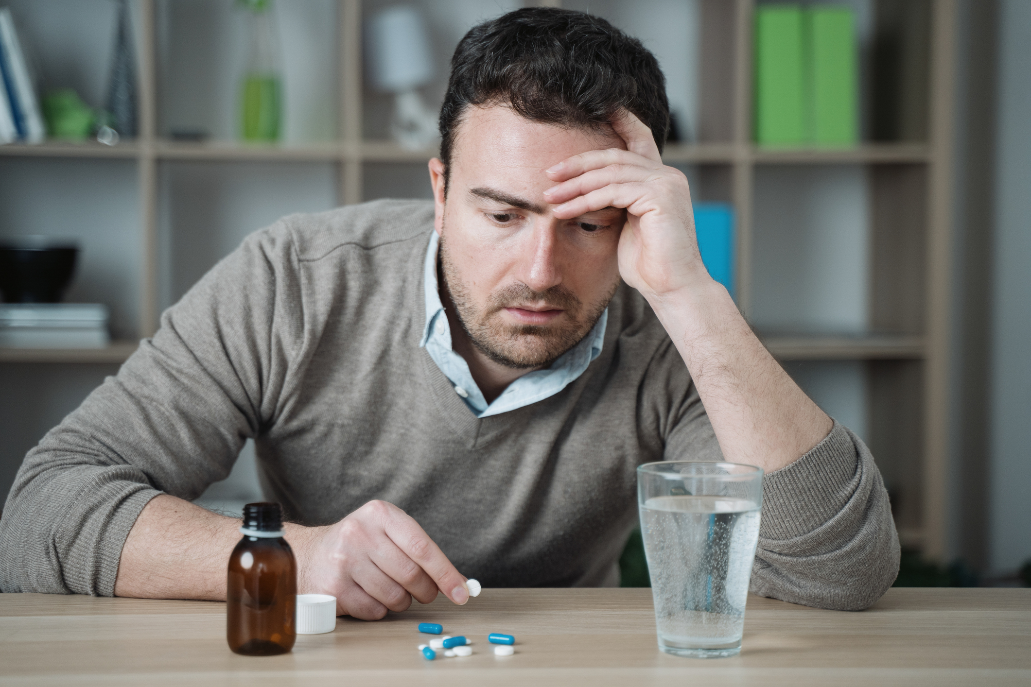 A medical professional discussing TMS therapy and benzodiazepines with a patient seeking relief from persistent anxiety
